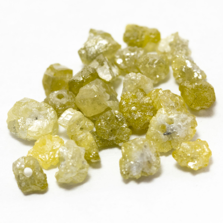 24 Gelbe Rohdiamanten 1.77 Ct, gebohrt