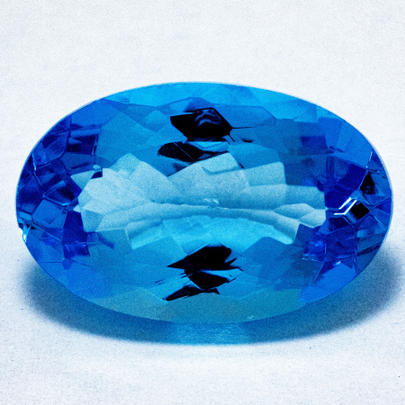 Topas in Swiss Blue mit 13.25 Ct, AAA Grade, sehr leicht beschädigt