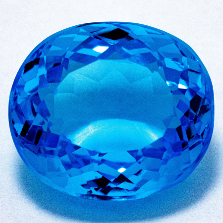 Topas in Swiss Blue mit 22.39 Ct, AAA Grade, sehr leicht beschädigt