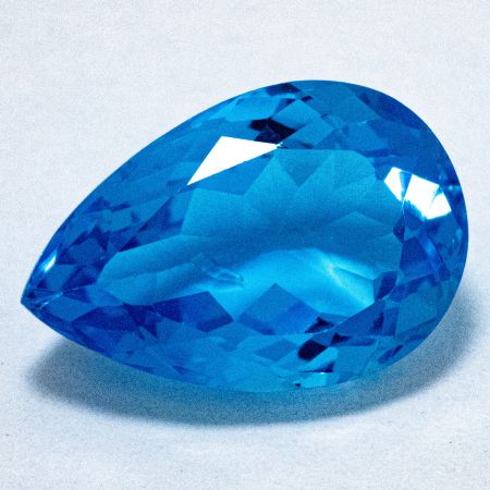 Topas in Swiss Blue mit 7.94 Ct, AAA Grade, leicht beschädigt