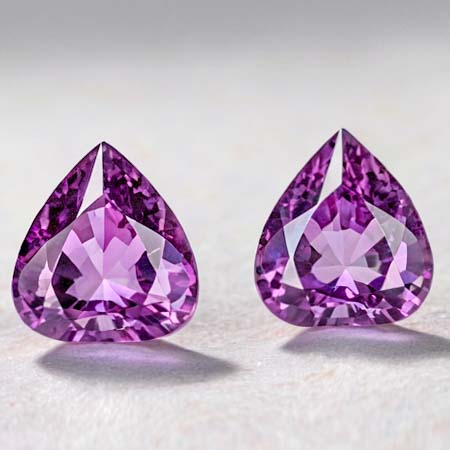 Amethyst Paar mit je ca. 11.3 x 10.3 mm, 7.28 Ct