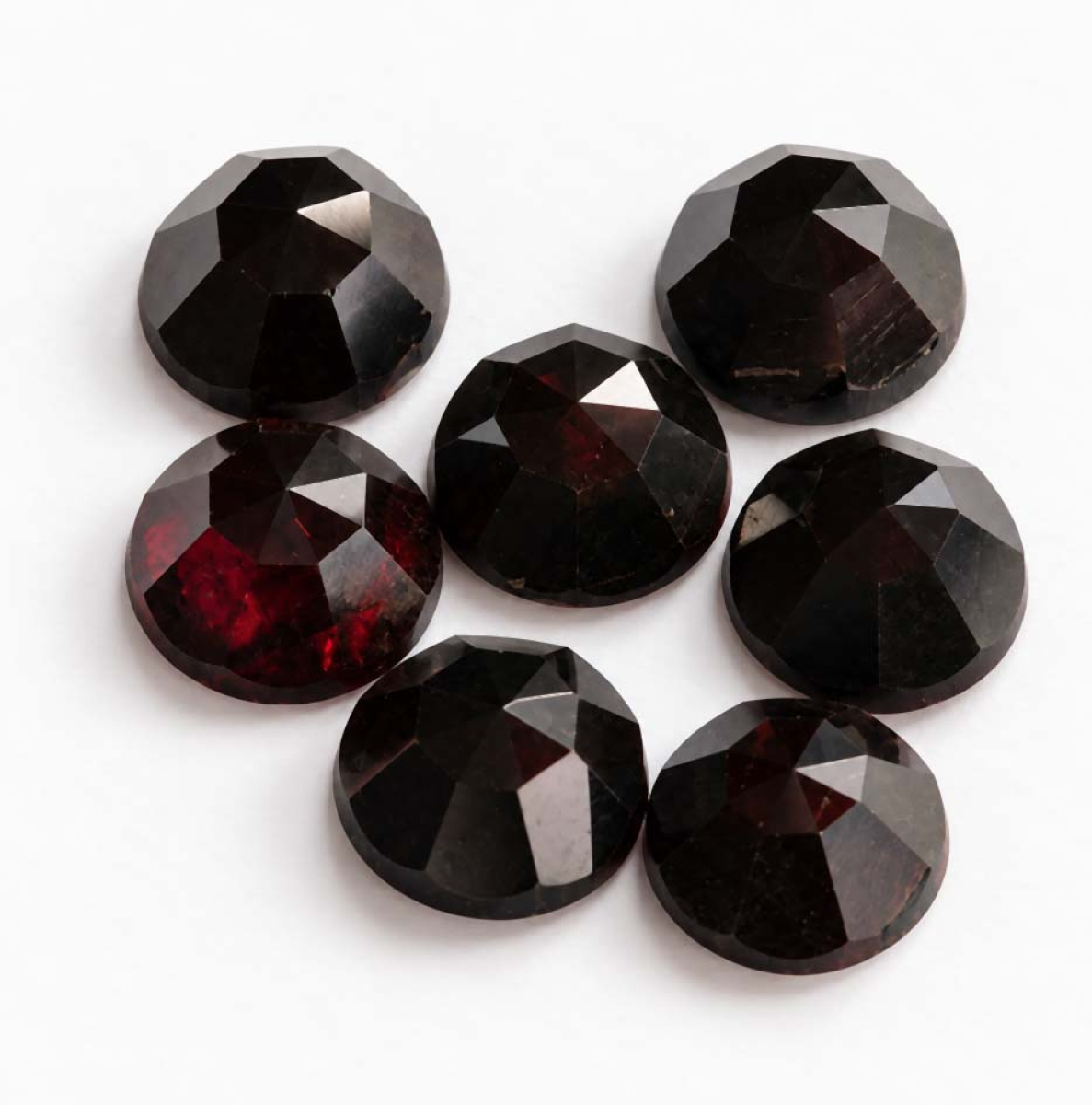 7 Granate mit 15.24 Ct, leicht beschädigt - Granate Ct