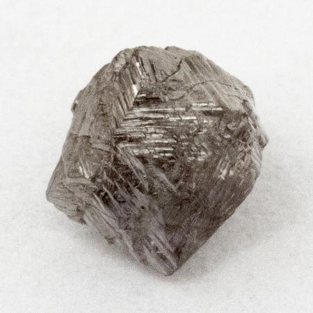 Pinkfarbener Rohdiamant mit 0.56 Ct