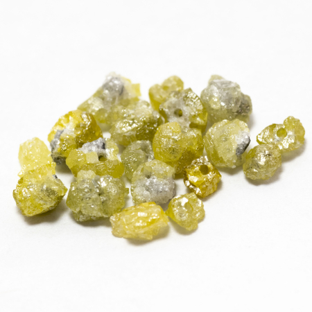 26 Gelbe Rohdiamanten 1.92 Ct, gebohrt