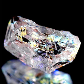Petroleum Quarz mit 5.26 Ct, fluoreszierend