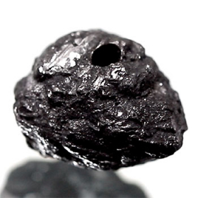 Schwarzer  Rohdiamant 4.15 Ct, gebohrt