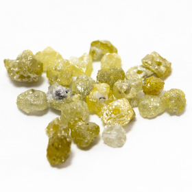 23 Gelbe Rohdiamanten 1.47 Ct, gebohrt